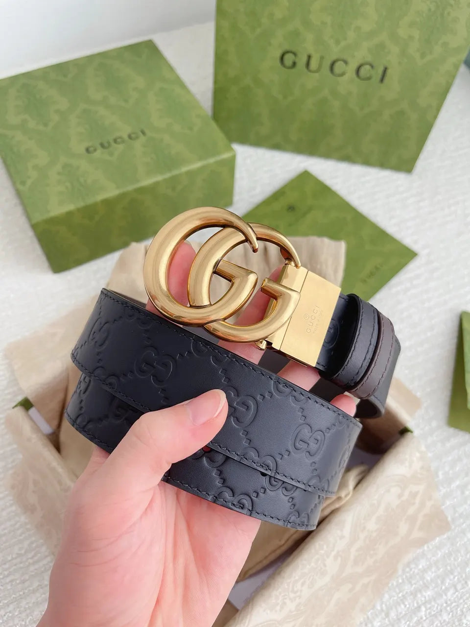 gold Gucci Black Embossed Leather Belt