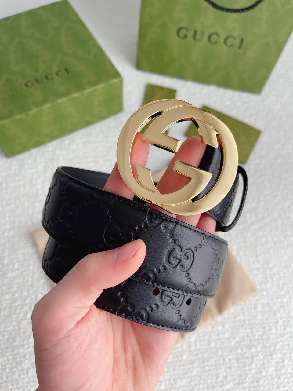 gold Gucci Black Embossed Belt