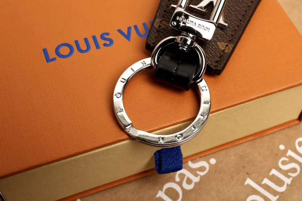 LV Monogram Leather Tab Keychain - Hình 4