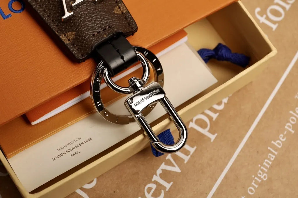 LV Monogram Leather Tab Keychain - Hình 6