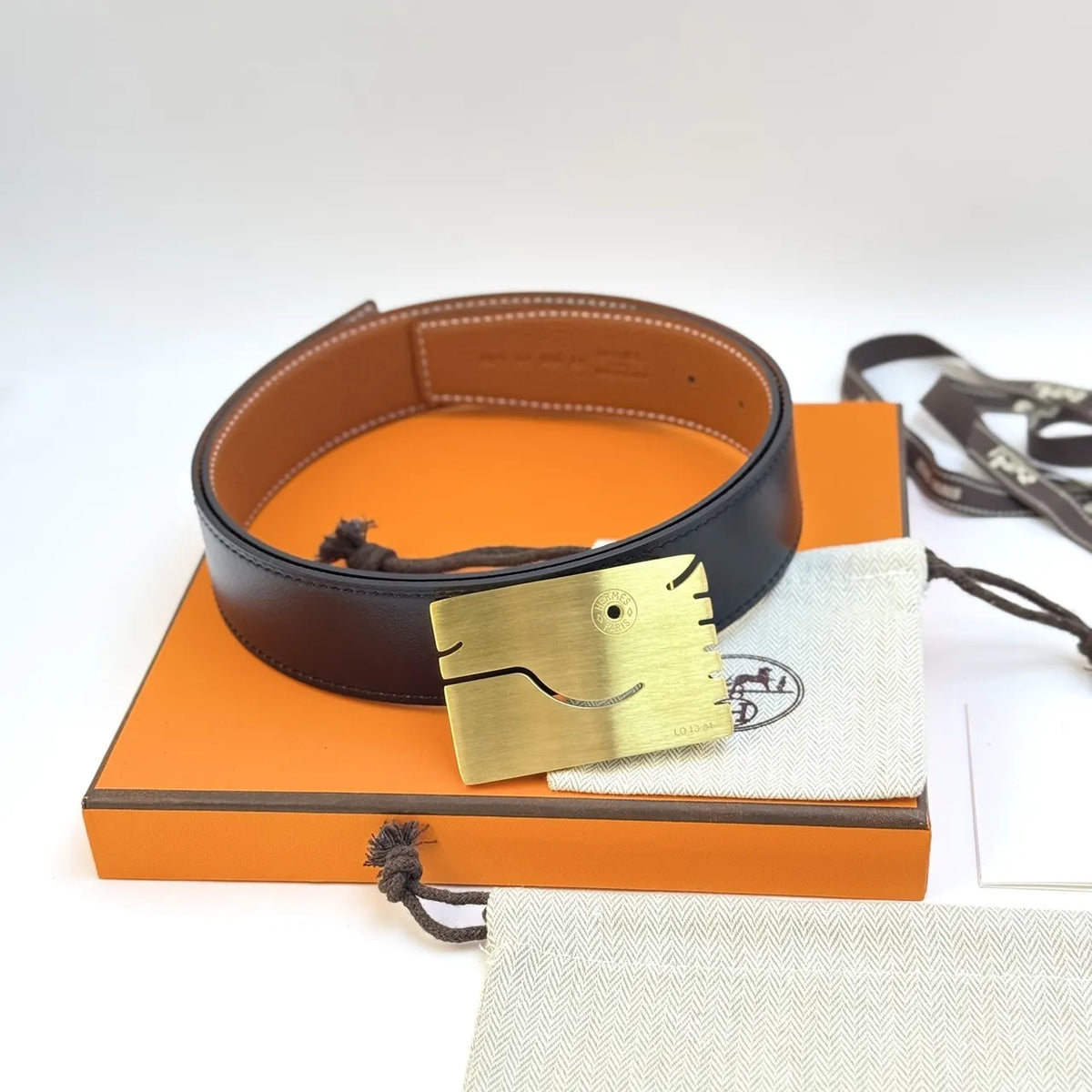 gold whimsical Hermes Black Leather Belt