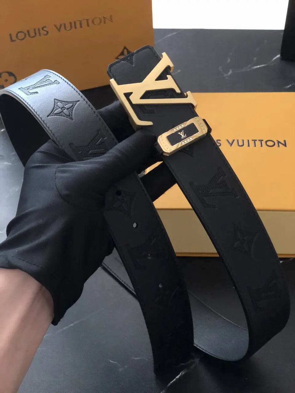 gold lv Louis Vuitton Black Embossed Belt - Hình 2