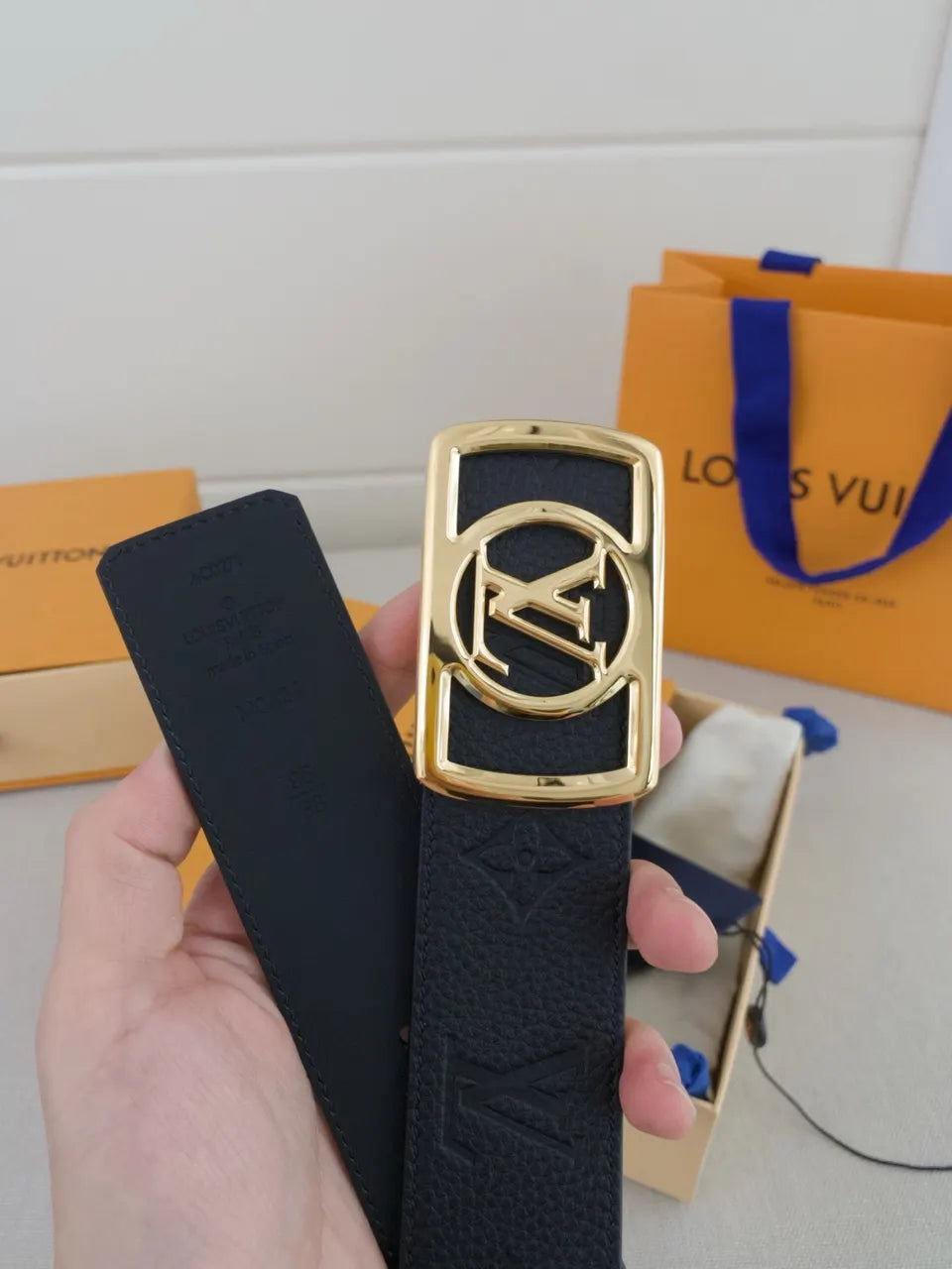 Louis Vuitton Black Leather Gold