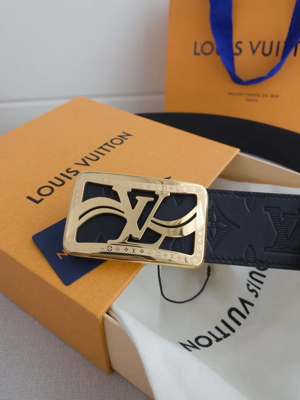 gold Louis Vuitton Black Embossed Belt