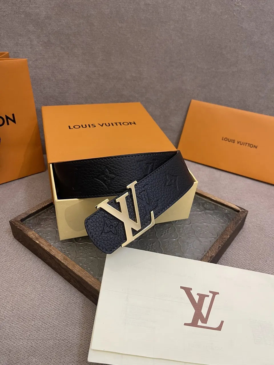 gold buckle Louis Vuitton Black Embossed Leather Belt - Hình 6