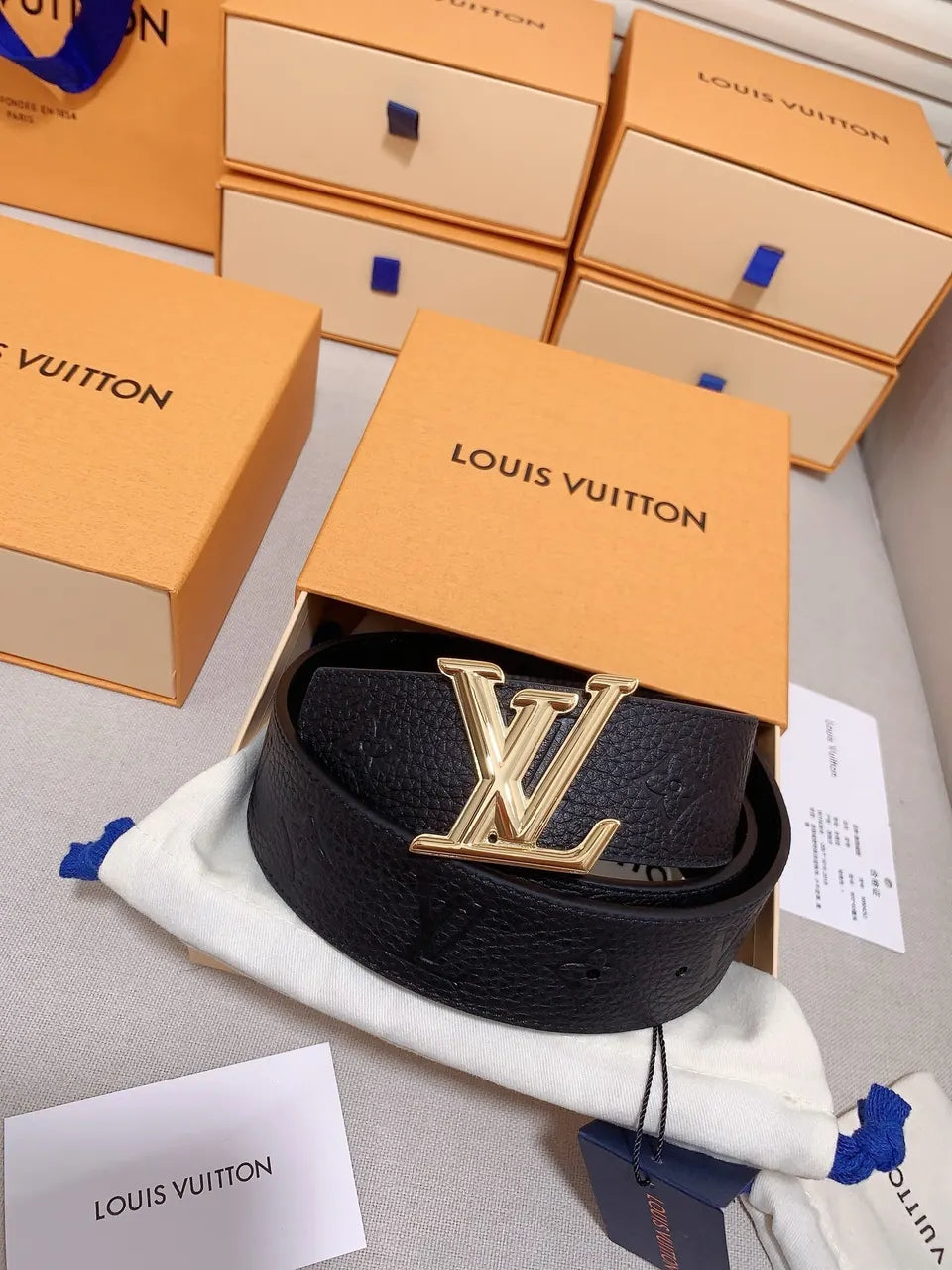 gold Louis Vuitton Black Embossed Leather Belt