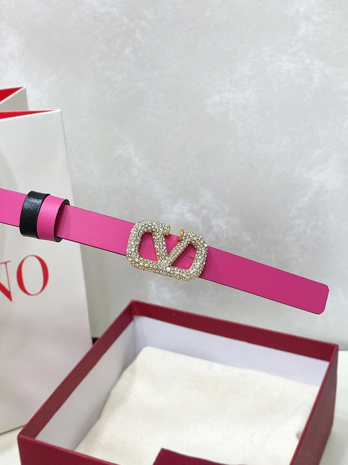 Pink leather belt with crystal buckle