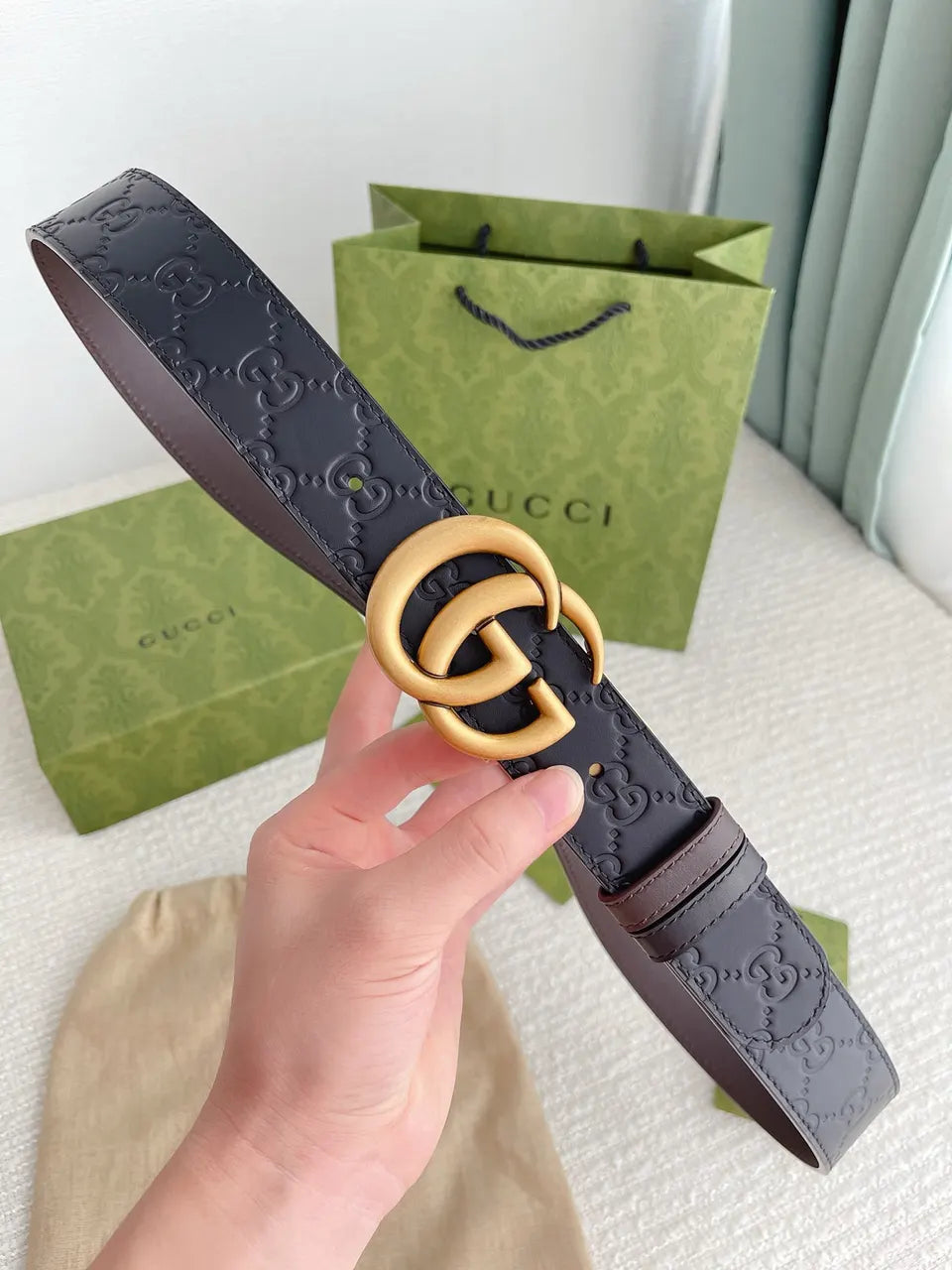gold Gucci Embossed Black Belt - Hình 2